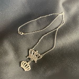 Silver necklace 20 inch chain. Costume jewelry with 2 crowns.